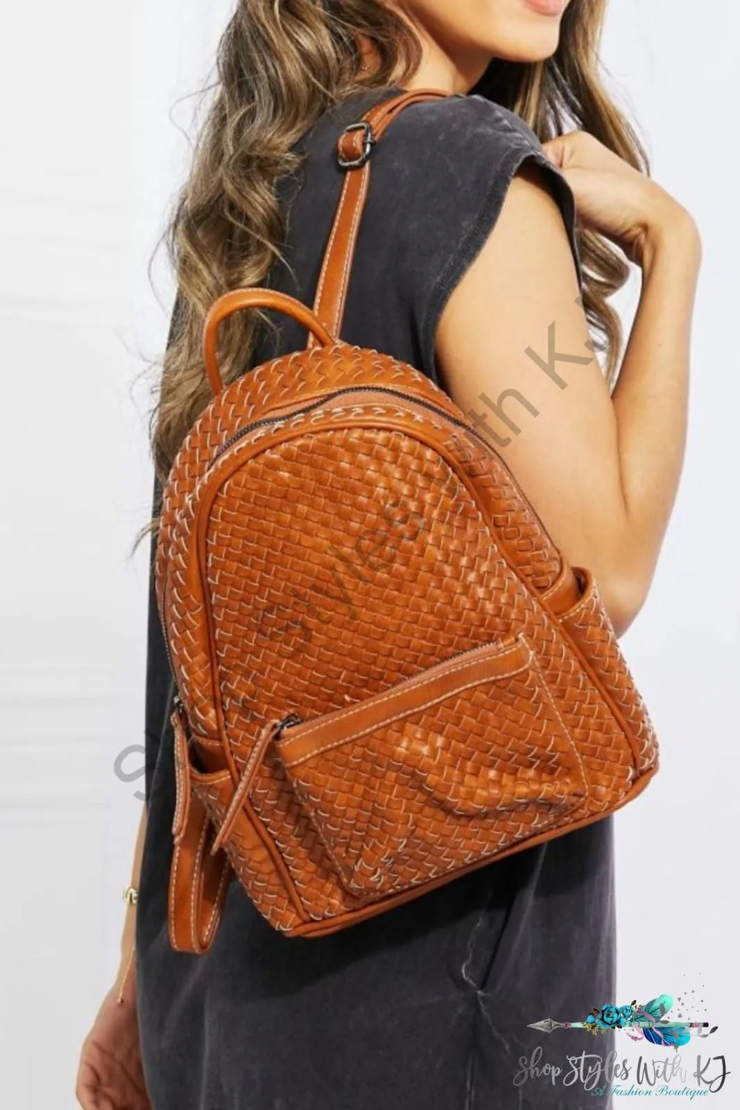 Certainly Chic Faux Leather Woven Backpack