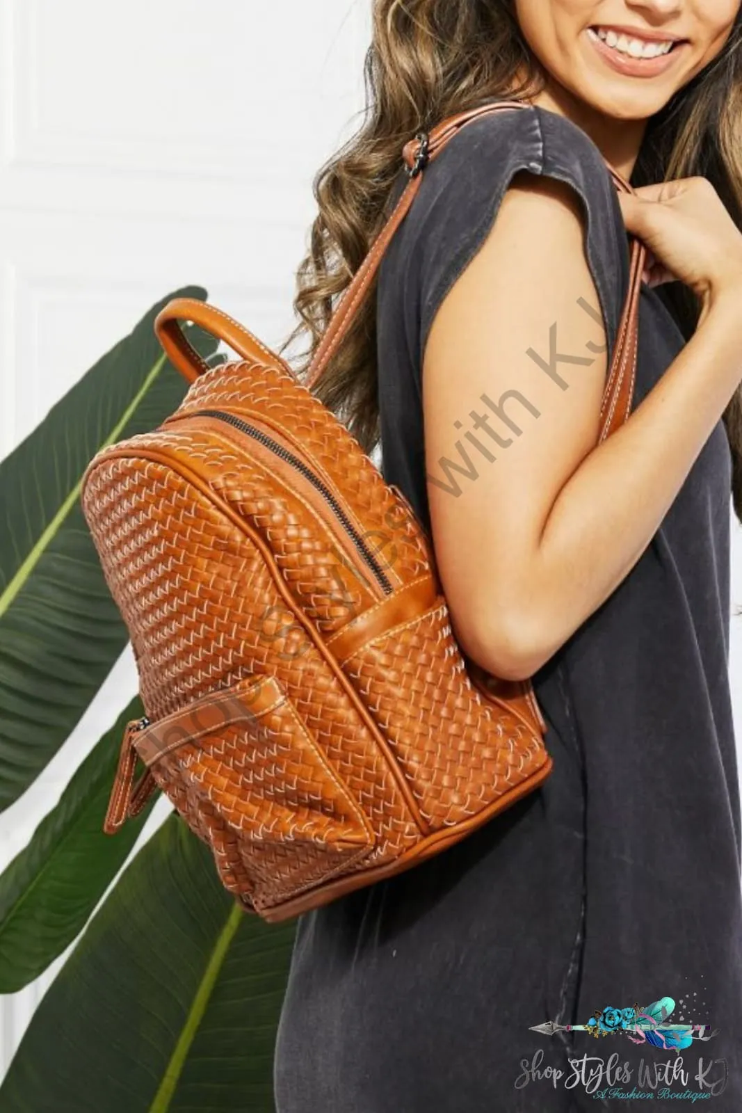 Certainly Chic Faux Leather Woven Backpack