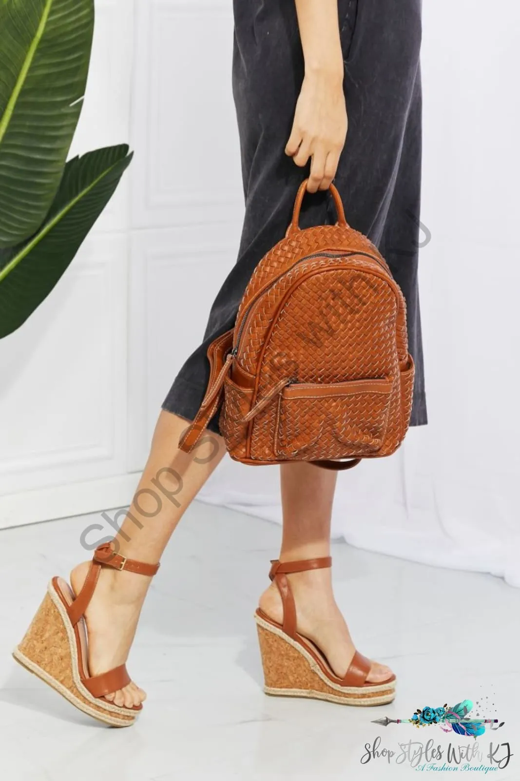 Certainly Chic Faux Leather Woven Backpack